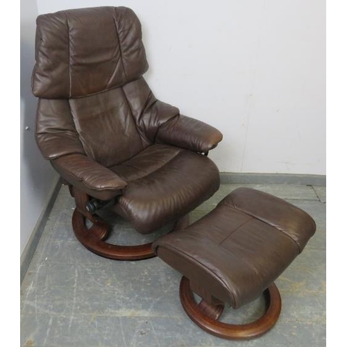 783 - A ‘stressless’ reclining lounge chair by Ekornes, upholstered in soft brown leather, with adjustable... 