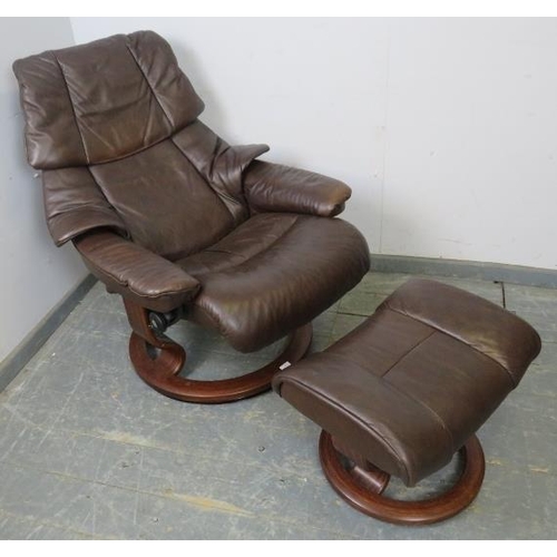 783 - A ‘stressless’ reclining lounge chair by Ekornes, upholstered in soft brown leather, with adjustable... 