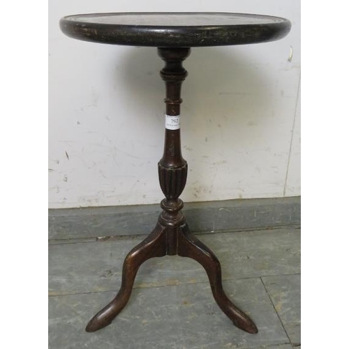 792 - A vintage Regency Revival mahogany wine table, the dished top on a tapering fluted column with splay... 