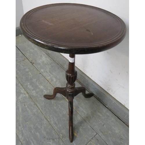 792 - A vintage Regency Revival mahogany wine table, the dished top on a tapering fluted column with splay... 