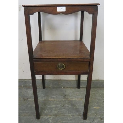 805 - A George III mahogany two-tier wash stand, the single drawer with reeded edge, on square supports. 
... 