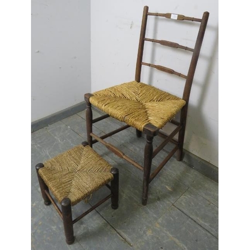 809 - An antique elm country chair with rush seat and double side stretchers, together with a small rope s... 