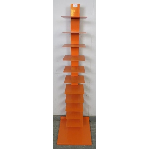 810 - A contemporary display stand, painted orange, having 11 open shelves, on a square plinth base.
H140c... 