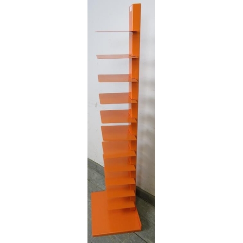 810 - A contemporary display stand, painted orange, having 11 open shelves, on a square plinth base.
H140c... 