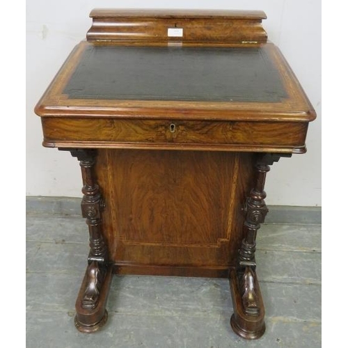 814 - A late Victorian burr walnut Davenport, having satinwood inlay and strung with boxwood and ebony, th... 