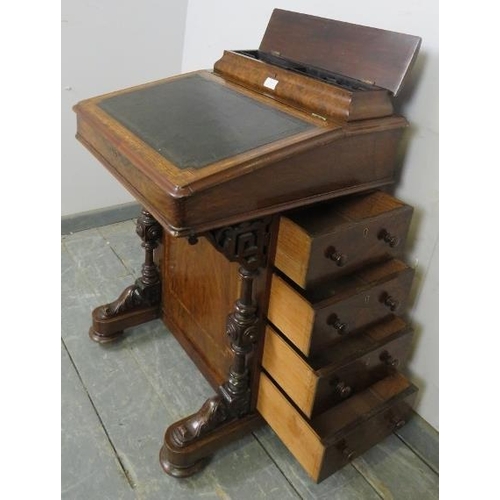 814 - A late Victorian burr walnut Davenport, having satinwood inlay and strung with boxwood and ebony, th... 