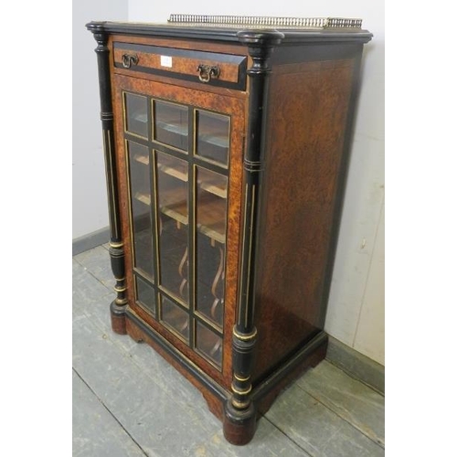 815 - A late Victorian burr walnut ebonised and inlaid music cabinet, having brass ¾ gallery above one lon... 