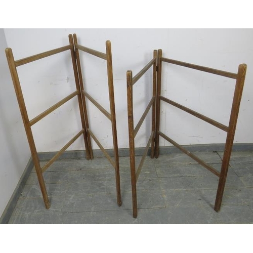 825 - A matched pair of antique pine folding towel rails. 
H107cm W61cm D4cm (approx).
Condition report: S... 