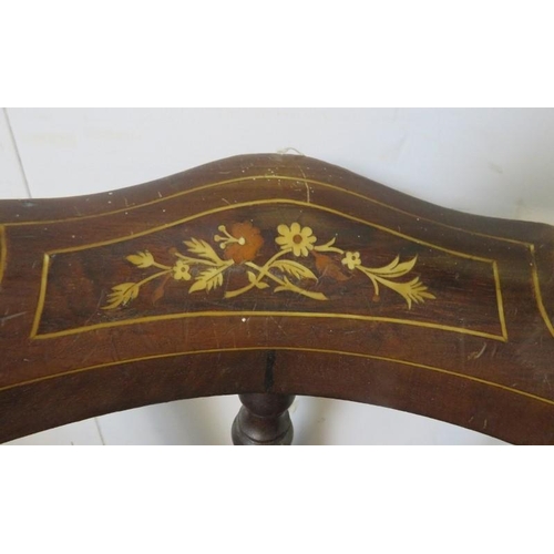 830 - A matched pair of Edwardian marquetry inlaid corner chairs, on turned supports with an ‘X’ stretcher... 