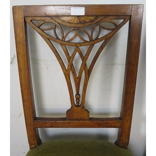 831 - A pair of Georgian fruitwood side chairs, the pierced backs with batwing inlay, on tapered square su... 