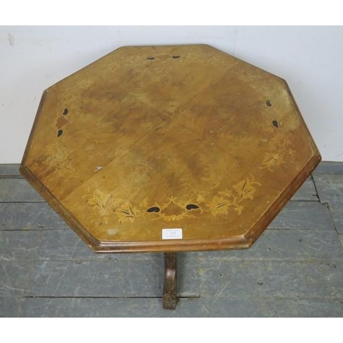 832 - A Victorian walnut octagonal centre table, the quarter veneered top with marquetry inlay, on a clust... 