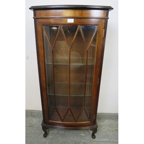 843 - A vintage Edwardian style mahogany display cabinet of small proportions, the astral glazed door open... 