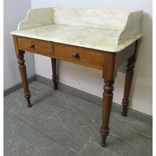 846 - A Victorian mahogany washstand, the white marble top with ¾ gallery, housing two short drawers with ... 