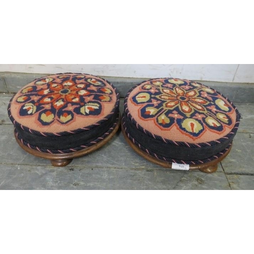 848 - A pair of 19th century walnut footstools recovered with brightly coloured Middle Eastern tapestry ma... 