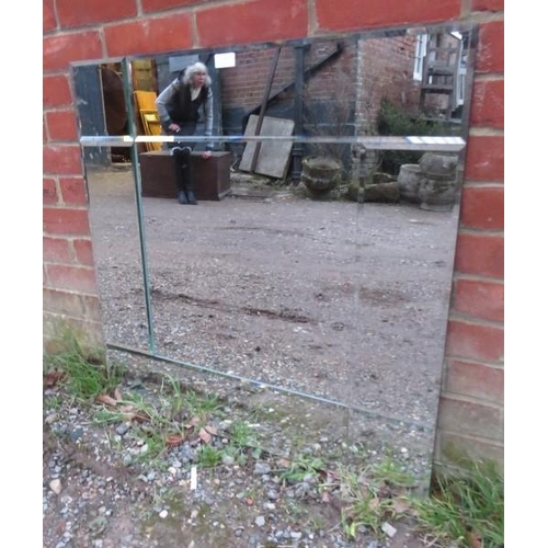 852 - A large contemporary square wall mirror with sectioned and bevelled plates. 
H80cm W80cm (approx).
C... 