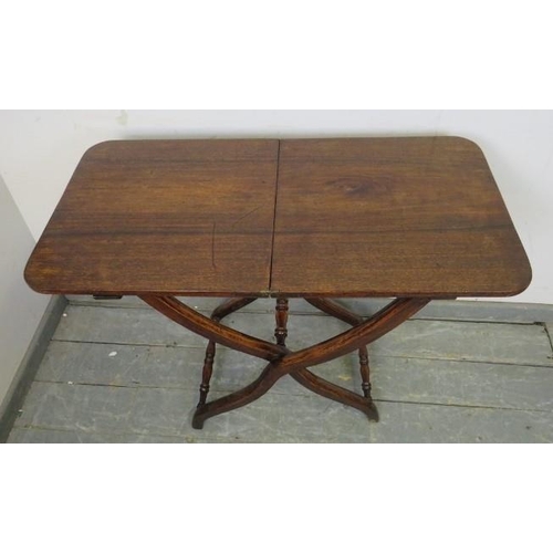 855 - A 19th century mahogany folding coaching table, on curved supports with turned stretchers. 
H73cm W9... 