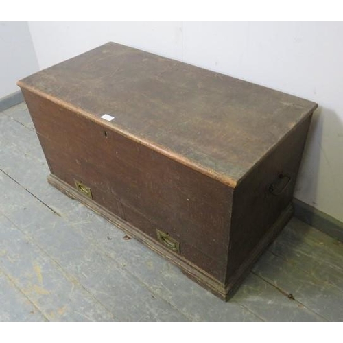 871 - A 19th Century oak mule chest of small proportions having two short drawers with brass campaign styl... 