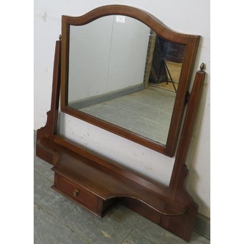 887 - An Edwardian mahogany swing vanity mirror strung with boxwood, the uprights with brass acorn finials... 