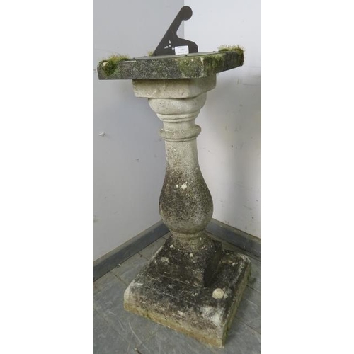 898 - A nicely weathered vintage sandstone sundial, the top with engraved Roman numerals, on a baluster co... 