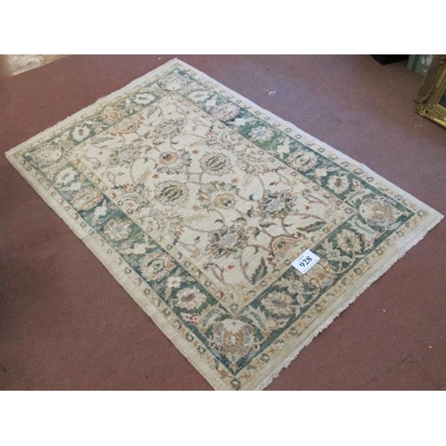 928 - A late 20th century wool rug. Flower design, green on cream ground, nice rug. Good clean condition. ... 