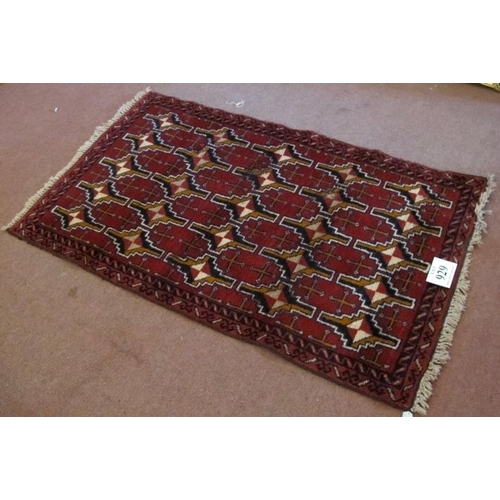 929 - Mid-late 20th century Persian rug central repeat motif block pattern on a deep red ground. 150cm x 8... 