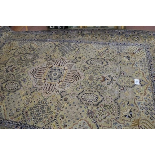 938 - Central Persian Kashmar carpet. Central motif and a repeat pattern central field on cream ground. 40... 