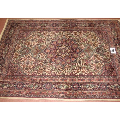 942 - Mid 20th century Persian rug, Naim central motif, cream on brown ground, 208cm x 135cm (approx).
Con... 