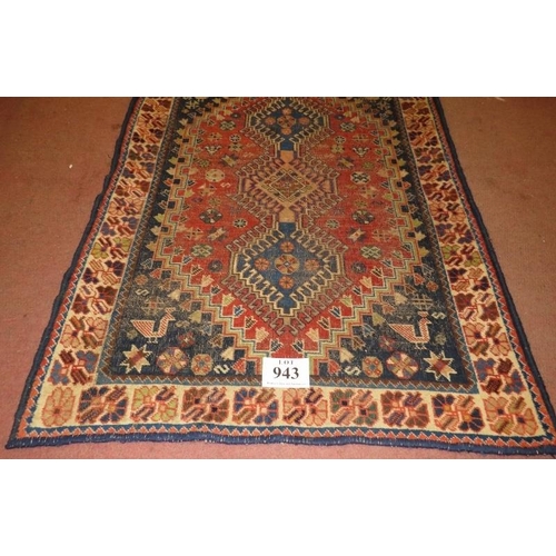 943 - Early mid 20th Century Persian Yalameh rug, three interlocking central motifs on a burnt amber field... 