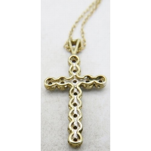 500D - A 9ct yellow gold crucifix set with twelve small diamonds on a fine chain, clasp 9ct, diamonds appro... 