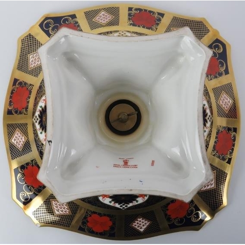 235 - A Royal Crown Derby Imari pattern porcelain comport. Pattern 1128. Modelled with dolphins spanning t... 