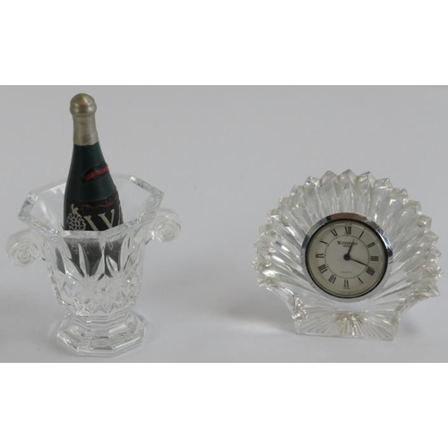 238 - A Waterford novelty crystal champagne bucket of campagna urn form and a bedside clock of scallop she... 