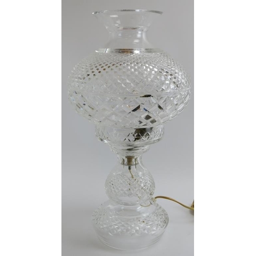 239 - A large Waterford crystal table lamp. Formed in two sections. Waterford mark present. 49 cm height. ... 