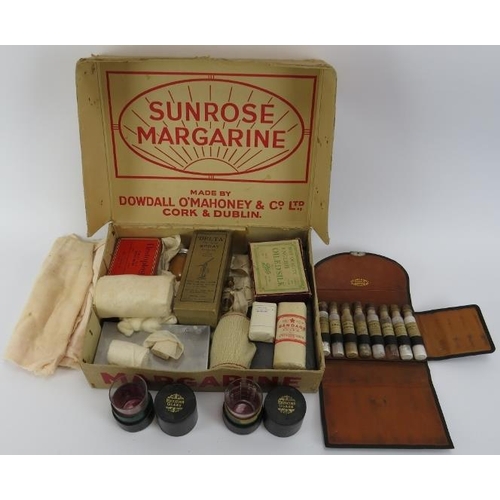 259 - A vintage First Aid kit, medicine glasses and apothecary bottle in a case. (Quantity). 
Condition re... 