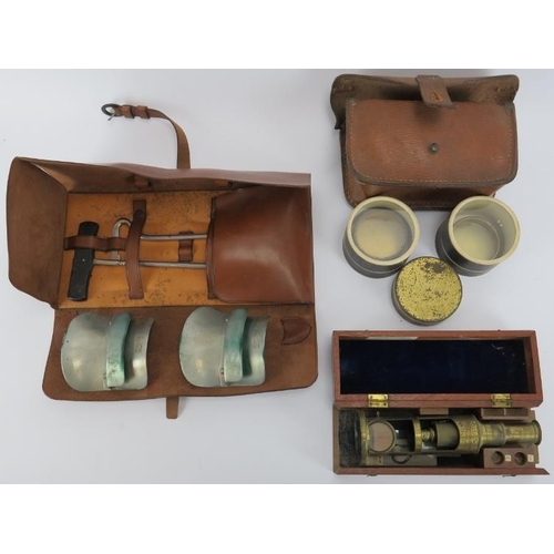 260 - A vintage cased field microscope, specimen dishes in a leather pouch together with horse riding impl... 