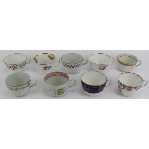 265 - A group of Newhall blue and white and polychrome painted tea cups, early 19th century. Tallest cup: ... 