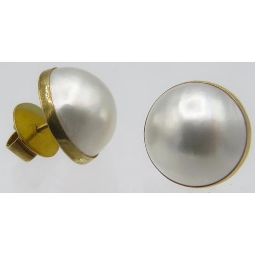 346 - A pair of 9ct yellow gold Mabe pearl earrings, approx 15mm across with butterfly backs. Approx weigh... 