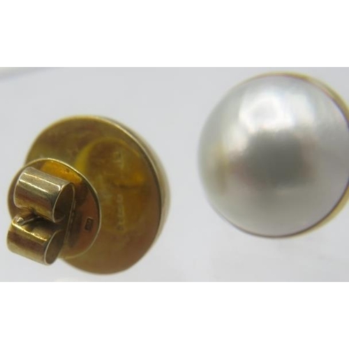 346 - A pair of 9ct yellow gold Mabe pearl earrings, approx 15mm across with butterfly backs. Approx weigh... 