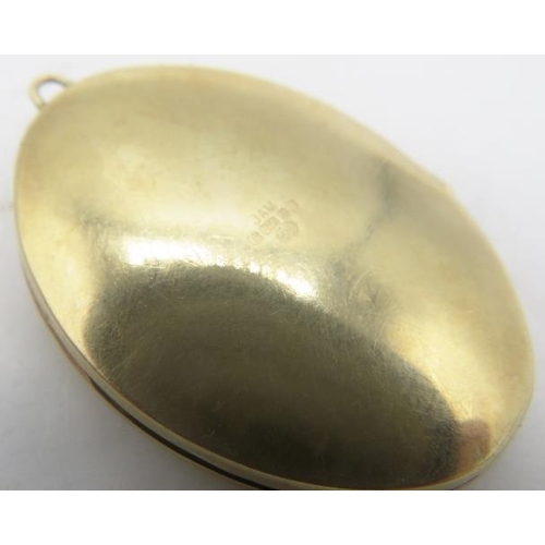 353 - A 9ct yellow gold oval locket. Approx 40mm long, approx weight 7.6 grams.
Condition report: Some sur... 