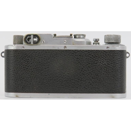 39 - A vintage Leica 111b camera, circa 1938 to 1941. With a Leitz Elmar lens, leather case and manual. S... 