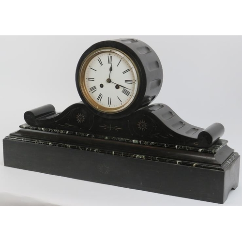 6 - A large Victorian slate and marble mantle clock. The enamelled white dial with black Roman numerals.... 