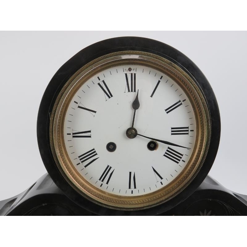 6 - A large Victorian slate and marble mantle clock. The enamelled white dial with black Roman numerals.... 