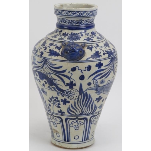 64 - A Chinese Ming dynasty style blue and white porcelain twin handled vase, 20th century. The handles m... 