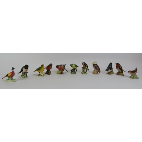 66 - A group of vintage Beswick miniature porcelain bird figurines. Comprising an owl, pheasant, blue tit... 