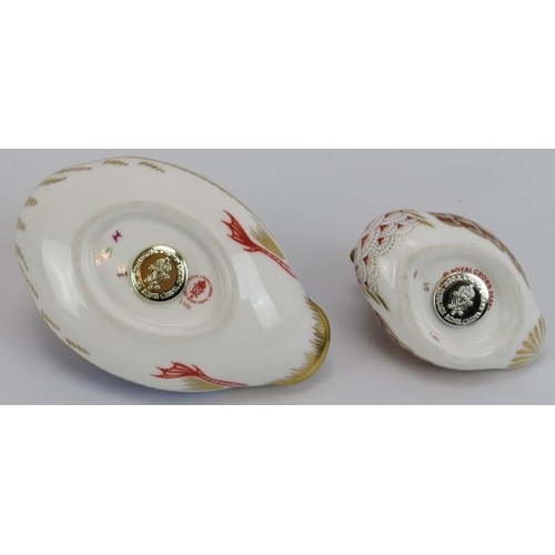 7 - Two Royal Crown Derby porcelain duck paperweight figurines. (2 items) 12 cm length, 7.5 cm length.
C... 