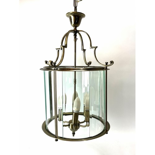 261 - A large modern glass panel metal hall lantern. Panelled section: 31 cm height. 
Condition report: So... 