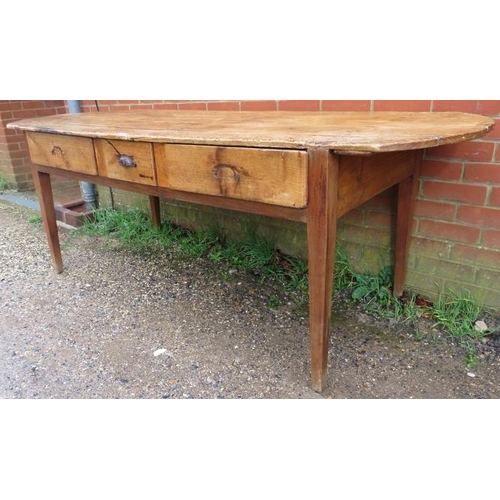 704 - A rustic antique French chestnut farmhouse table, having three drawers to one side with cast iron sc... 