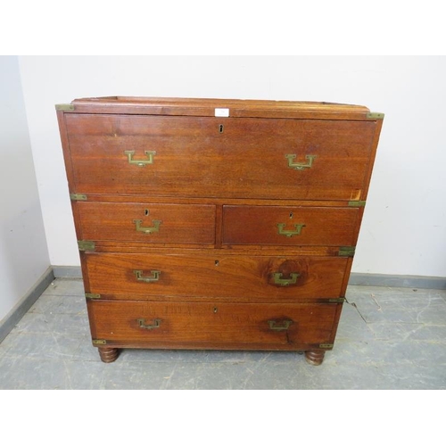 705 - A 19th century camphorwood brass mounted campaign secretaire chest, the fall front opening onto a fi... 