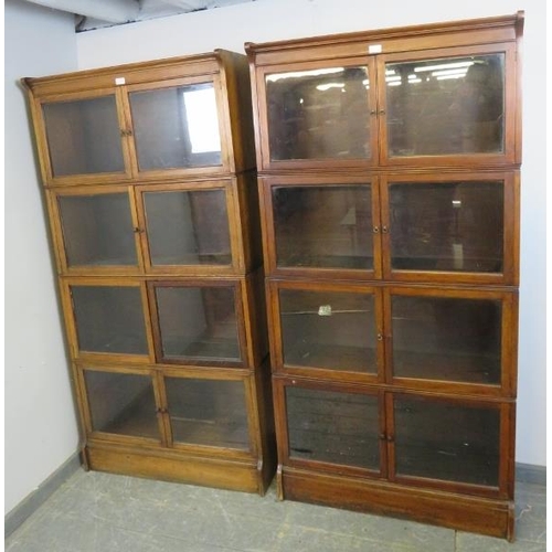 710 - A pair of early 20th century mahogany stacking solicitor’s bookcases, each comprising four sections ... 