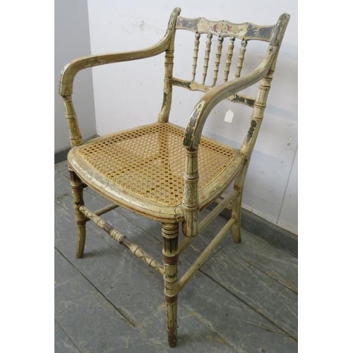 719 - A Regency Period faux bamboo elbow chair, the beech frame retaining the original polychrome paintwor... 