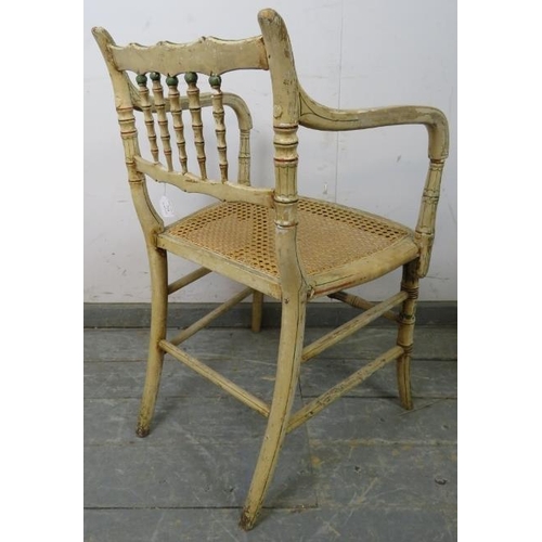 719 - A Regency Period faux bamboo elbow chair, the beech frame retaining the original polychrome paintwor... 